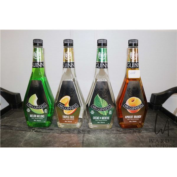Four assorted bottles of McGuiness liquor including one Melon 750ml / 15% ABV, one Creme De Menthe 7