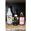 Image 1 : Three assorted bottles of liquor including one Malibu original 750ml / 21% ABV, one Rocky Mountain B