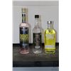 Image 1 : Three assorted bottles of vodka including one Absolut Citron Lemon Vodka 750ml / 40% ABV, one T-Rex 