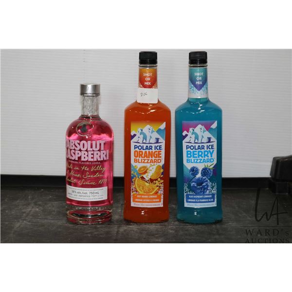 Three assorted bottles of vodka including one Absolut Raspberri 750ml / 38% ABV, one Polar Ice Orang
