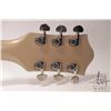 Image 13 : Gretsch semi hollow guitar with cat eye top and Bigsby tremolo arm with three Humbucker stacked pick