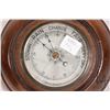 Image 2 : Vintage English made Aneroid barometer in oak mount, 6 1/2" in diameter, note: cracked glass and a b