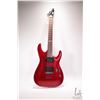 Image 1 : ESP Ltd. MH-50NT guitar with "string-thru-body" bridge design, ESP Humbucker pickups, in scarlet red