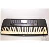 Image 2 : Yamaha Keyboard psr 190. Black colour, programmable keyboard with synthesizer, percussion brass wood
