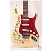 Image 2 : Red Fox Strat style guitar signed by the Family Brown band, ivory colour, SSS pickup configuration, 
