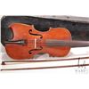 Image 2 : Unmarked 4/4 violin. Includes two bows, extra bridge and a black wooden case with blue felt lining. 