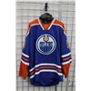 Image 1 : NHL Reebok Edmonton Oilers Ryan Smyth No. 94 hockey jersey. Adult size 52. Note: some marks and stai