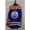 Image 1 : NHL Reebok Edmonton Oilers Taylor Hall No. 4 hockey jersey. Adult size XL. Note: marks and staining