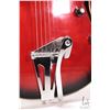 Image 3 : Raven hollow body electric guitar with red burst finish and black pick guard, equipped with Bigsby s