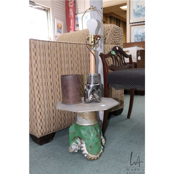 Well drill bit converted to side table 11" in height and a nickel plated drill bit motif 20" lamp an