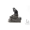Image 1 : Hand carved black soapstone, titled on underside "Wolf" and signed by artist M. Totan, 4 1/2" in hei