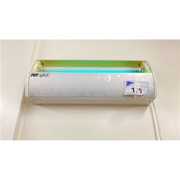 FLY LIGHT JUNIOR ELECTRIC BLUE LIGHT BUG ATTRACTIVE LIGHT WITH STICKY STRIP. LOCATED IN BOTTLING