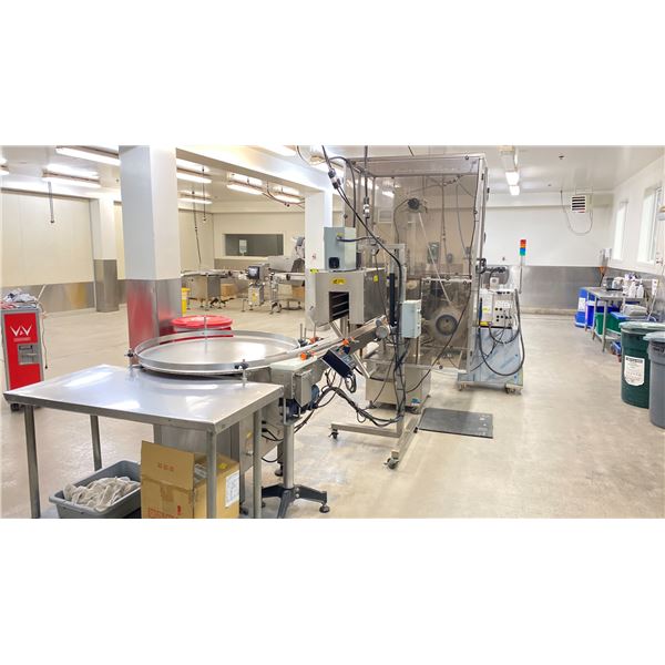 INTEGRATED LINE FOR CAPPING, LABELING, CODING, METAL DETECTING FOR SQUARE AND OCTAGONAL JARS.
