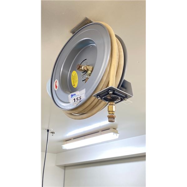 WATER HOSE REEL MUST BE REMOVED FROM THE WALL LOCATED IN LINE 2 ROOM