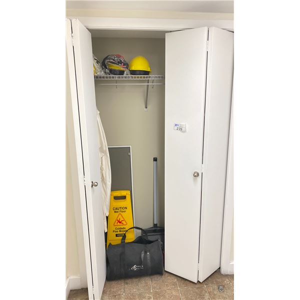 CONTENTS OF CLOSET NEAR SCIENCE ROOM. 7 HARD HATS, BAG, WET FLOOR SIGNS, BRUSH AND DUSTPAN, LAB