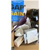 Image 17 : CONTENTS OF PRODUCT TEST KITCHEN. MEASURING CUPS, SPOONS, GLOVES, BOWLS, CUTTING BOARDS, UTENSILS,