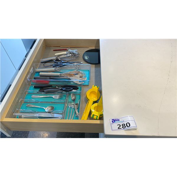 CONTENTS OF PRODUCT TEST KITCHEN. MEASURING CUPS, SPOONS, GLOVES, BOWLS, CUTTING BOARDS, UTENSILS,