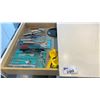 Image 1 : CONTENTS OF PRODUCT TEST KITCHEN. MEASURING CUPS, SPOONS, GLOVES, BOWLS, CUTTING BOARDS, UTENSILS,