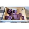 Image 7 : CONTENTS OF PRODUCT TEST KITCHEN. MEASURING CUPS, SPOONS, GLOVES, BOWLS, CUTTING BOARDS, UTENSILS,