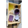 Image 8 : CONTENTS OF PRODUCT TEST KITCHEN. MEASURING CUPS, SPOONS, GLOVES, BOWLS, CUTTING BOARDS, UTENSILS,