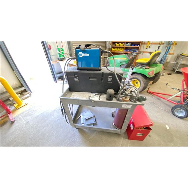 MILLER TIG WELDER MODEL MAXSTAR 161STL WITH TANK ON CART. INC ASST WELDING ROD AND TOOL BOX WITH