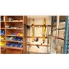 Image 1 : GROUP OF TOOLS ON WALL. TOILET AUGER, BAR CLAMPS, 2X 4' LEVELS, DRYWALL SQUARES, SAWS, ASST