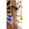 Image 2 : GROUP OF TOOLS ON WALL. TOILET AUGER, BAR CLAMPS, 2X 4' LEVELS, DRYWALL SQUARES, SAWS, ASST