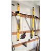 Image 3 : GROUP OF TOOLS ON WALL. TOILET AUGER, BAR CLAMPS, 2X 4' LEVELS, DRYWALL SQUARES, SAWS, ASST