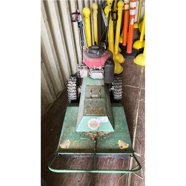 OUTBACK BRUSH CUTTER 26"W 13HP BRIGGS & STRATTON. LOOKS DIRTY BUT TOLD IT WORKS WELL
