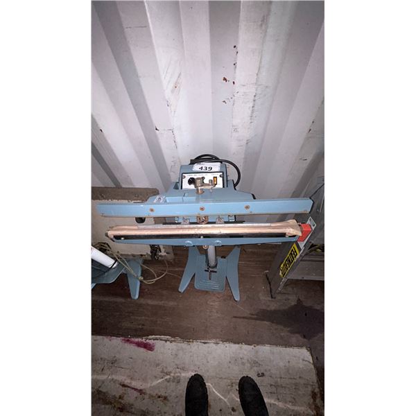 AMERICAN INTERNATIONAL ELECTRIC IMPULSE FOOT SEALER MODEL 600FL LOCATED IN CONTAINER