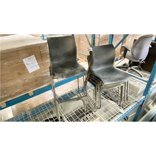 GROUP OF 7 TEKNION STACKING CHAIRS, 2 ARE TALL. LOCATED IN RACKING NEAR HEAT SEALER