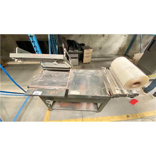 DAMARK 2 SIDED HEAT SEALER WITH CONVEYOR SYSTEM. COMES WITH ROLL OF FILM.