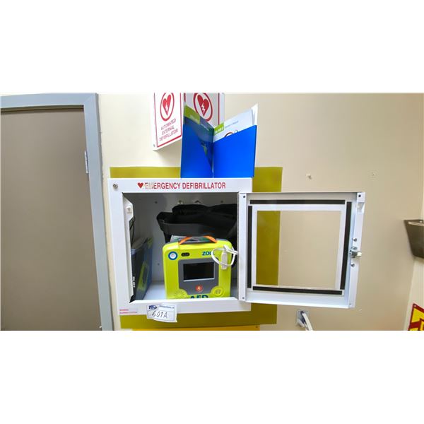 ZOLL AED EMERGENCY DEFIBRILLATOR AED3. LOCATED ON WALL NEAR MAINTENANCE ROOM. WITH CASE AND WALL BOX