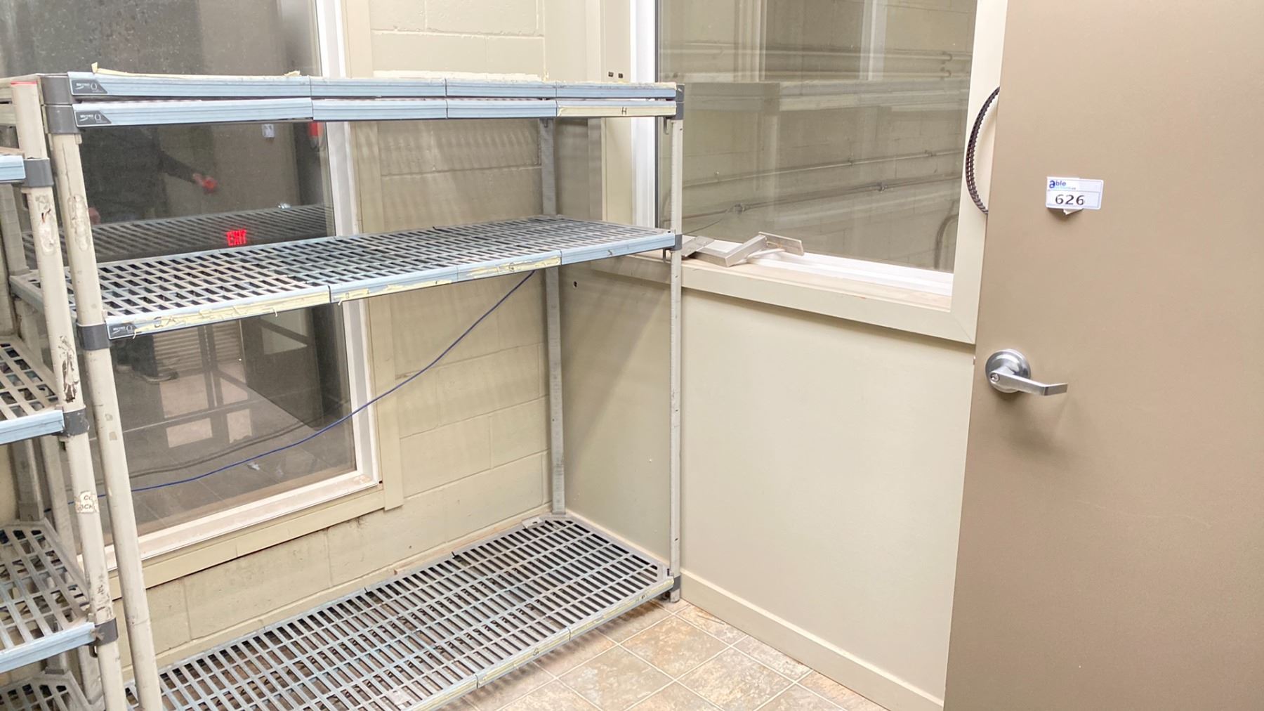 Metri Raksh CONTENTS OF STORAGE ROOM ABOVE JANITORIAL ROOM. 2X3'W METAL SHELVING ...
