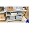 Image 1 : 4' X 30" STAINLESS TABLE WITH APPROX 15 BUS PANS