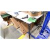 Image 2 : PAIR OF METAL FRAMED WORK BENCHES 66" X 33"  CONNECTED BACK TO BACK WITH OVERHEAD SHELF NO CONTENTS