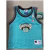 Image 2 : Porcelain Doll In Box, Plus 2 Canucks Die Cast Cars, and A Vintage Grizzlies Jersey and Basketball D