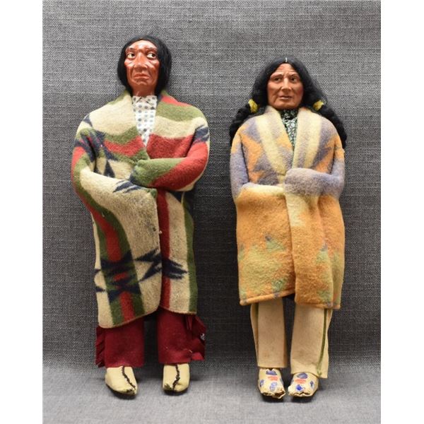 TWO SKOOKUM DOLLS