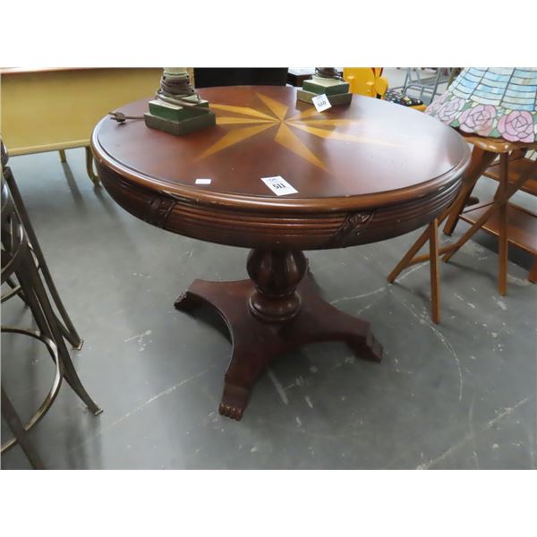 Ornately Carved Burl Top Round Cloth Foot Game Table