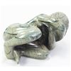 Image 1 : Green Marble Statue Girl Curled Up Rock Formation
