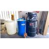 Image 1 : GROUP LOT OIL DRAIN PANS, FUNNELS, BARREL PUMP AND 3 BARRELS