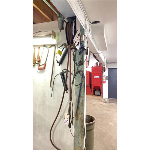 AIR HOSE ON REEL-MUST BE REMOVED FROM WALL