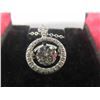 Image 2 : FLOATING 1.00 CT ROUND BRILLIANT CUT 