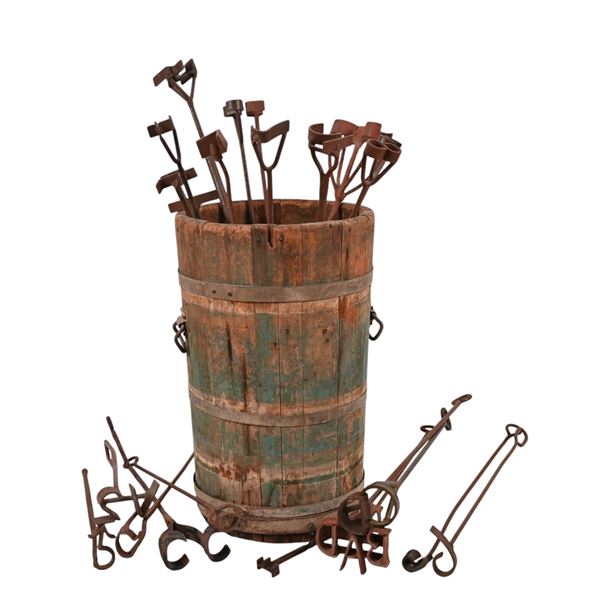 Collection of Branding Irons in Wooden Barrel