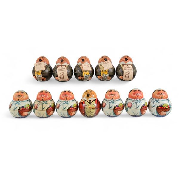 Collection of Little Man Roly Poly Tin Containers