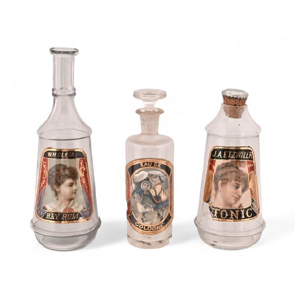 Three Assorted Label Under Glass Barber Bottles