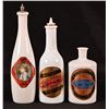 Image 1 : Three Assorted Milk Glass Barber Bottles