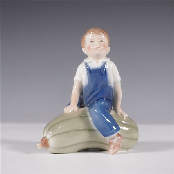 Royal Copenhagen Porcelain Figurine, Boy on Gourd