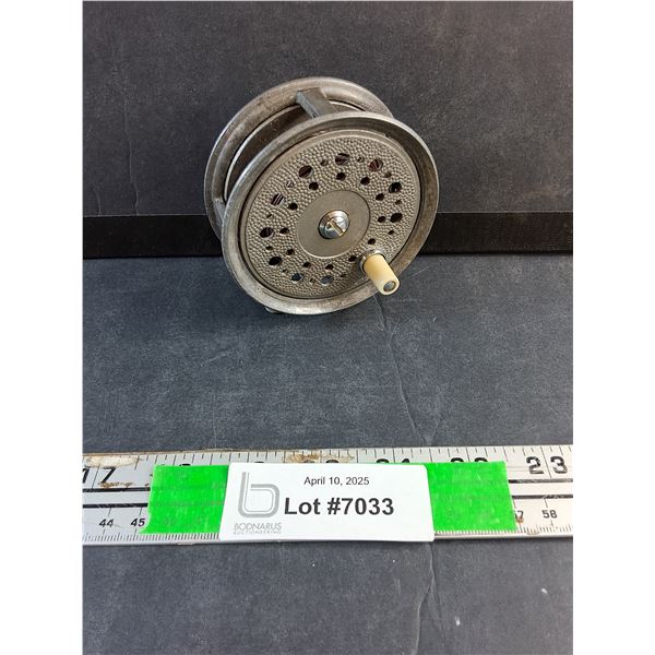 Vintage Fishing Reel with Trout Line