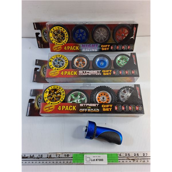 (3) pcs New Sealed Tire Spinners